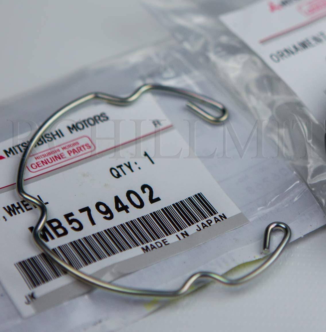 Кольцо ( пружинка ) колпачка диска "Mitsubishi" (Япония) /арт.MB579402/ Кольцо ( пружинка ) колпачка диска "Mitsubishi" (Япония) /арт.MB579402/